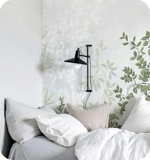 white botanical-print wallpaper featuring green leaves
